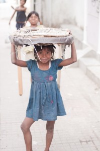 Street children pose for photos
